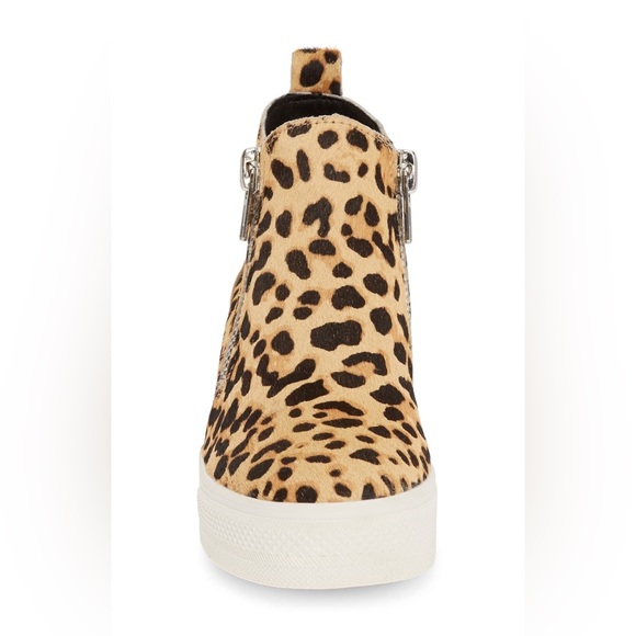 Furry upper material, Fabric lining, 2.75 inch hidden wedge, 1 inch rubber sole - Picture 2 of 4